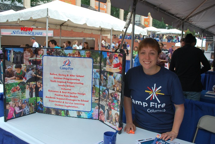 Mary Kate Narcisi told visitors to her booth about Camp Fire youth programs.