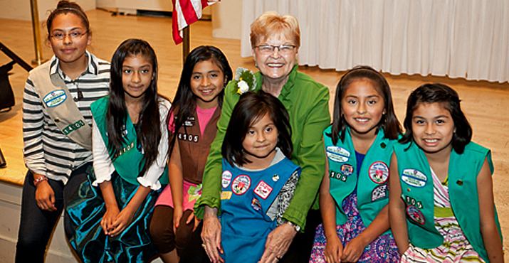 Former Governor of Oregon Barbara Roberts is pictured with Girl Scout Troop 14105 of Woodburn.