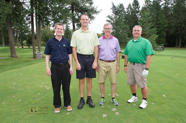 The Standard, this year's presenting sponsor, had several company teams at this years event. Christopher Conklin (left) is joined by Daniel McMillan, Greg Ness, and Davie Payne. David, a RMHC Board Member, also served as the Golf Committee Chair at this year's Golf Classic.