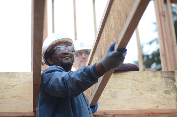 Habitat for Humanity Beneficiaries and Volunteers Work Side-by-Side