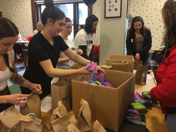 Volunteers Create PERIOD Packs for Needy Women