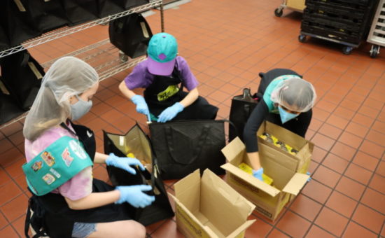 Local Girl Scouts Donate 30,000 Boxes of Cookies to Meals on Wheels People