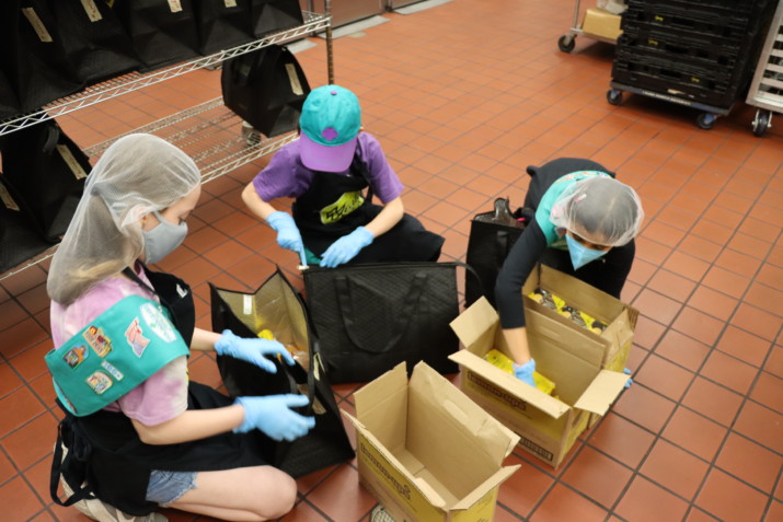 Local Girl Scouts Donate 30,000 Boxes of Cookies to Meals on Wheels People